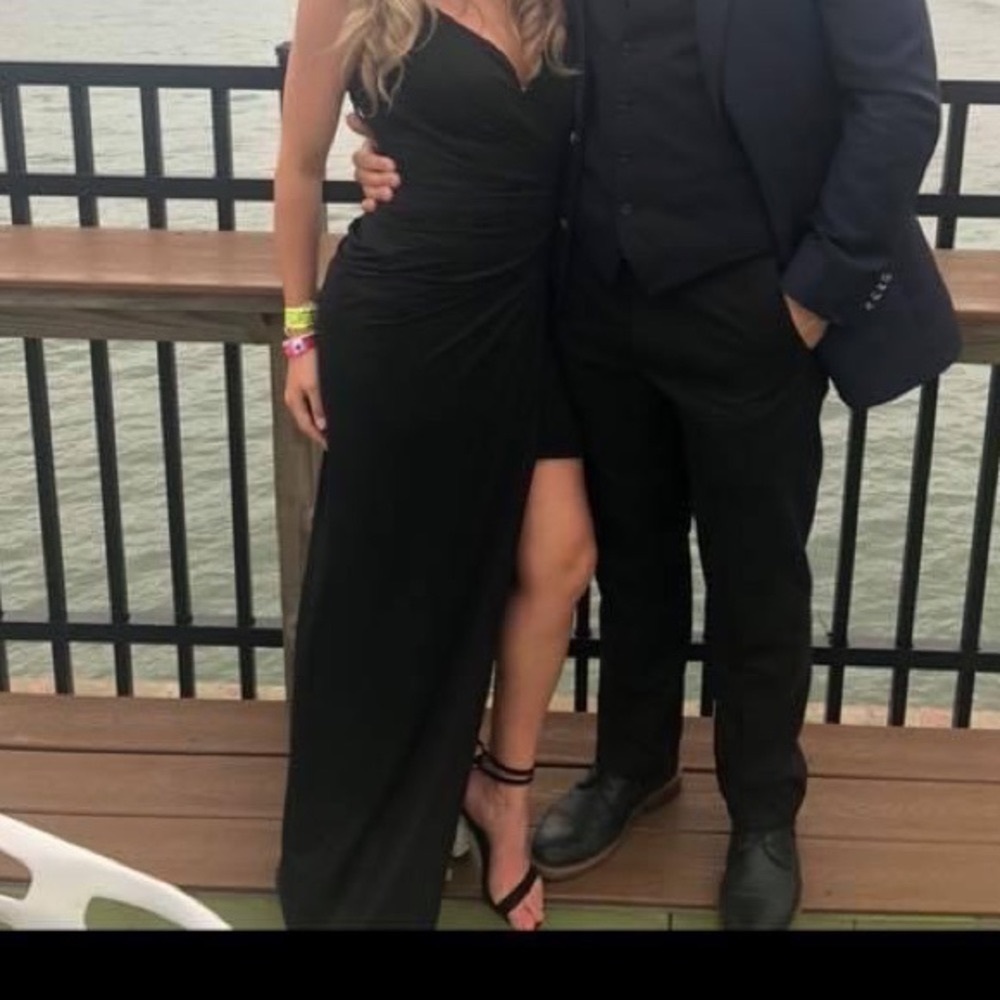 Bariano black evening gown. High leg slit and low gathered back